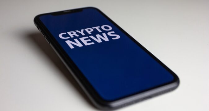 MunichGermanyNovember122022AnIphoneXrWithCrypto | Online Trading Secrets This Week in Crypto - Fintech Firm Finder Wins Legal Battle Against ASIC Over Its Crypto Yield Product